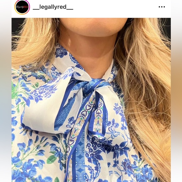 Stunning blue and white floral blouse. Blouse has a neck tie detail. - Picture 2 of 3